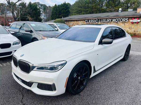 BMW 7 Series with VIN: WBA7H6C55JG614646