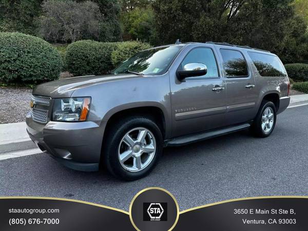 Chevrolet Suburban with VIN: 1GNSKKE76ER155036