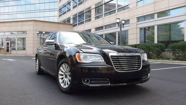 Chrysler 300 with VIN: 2C3CCAAGXEH160187