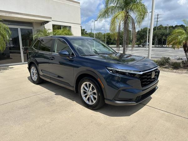 Honda CR-V with VIN: 7FARS3H48PE009720