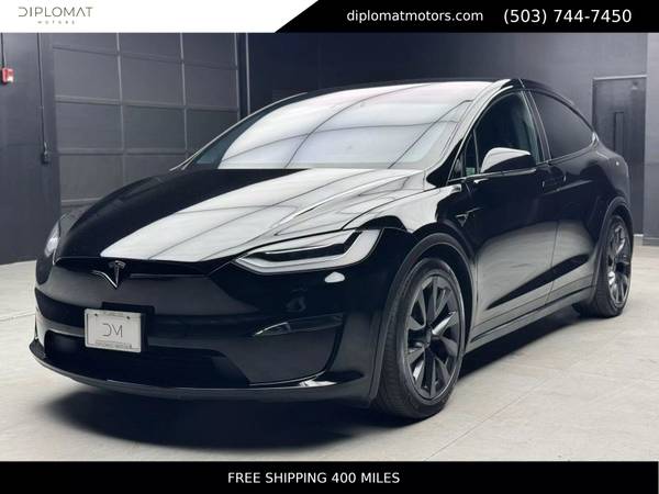 Tesla Model X with VIN: 7SAXCBE53NF328546