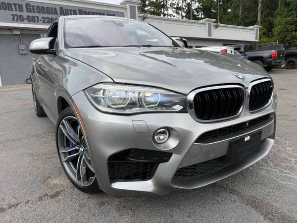 BMW X6 M with VIN: 5YMKW8C54F0R42825