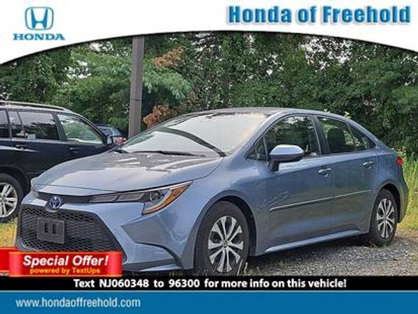 Toyota Corolla Hybrid with VIN: JTDEAMDE6NJ060348