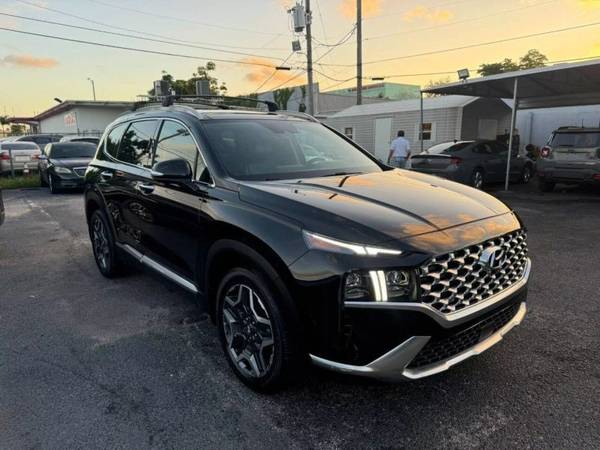 Hyundai Santa Fe with VIN: 5NMS44AL4MH347351
