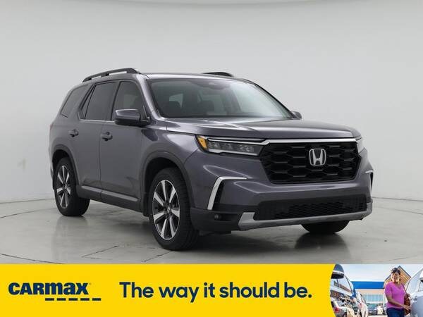 Honda Pilot with VIN: 5FNYG2H76PB003217