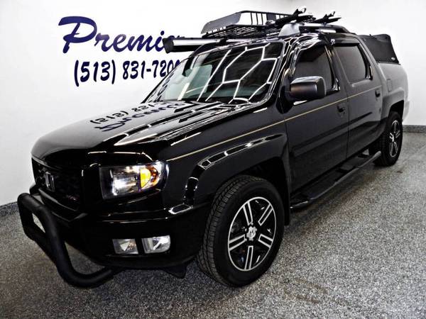 Honda Ridgeline with VIN: 5FPYK1F79EB011067