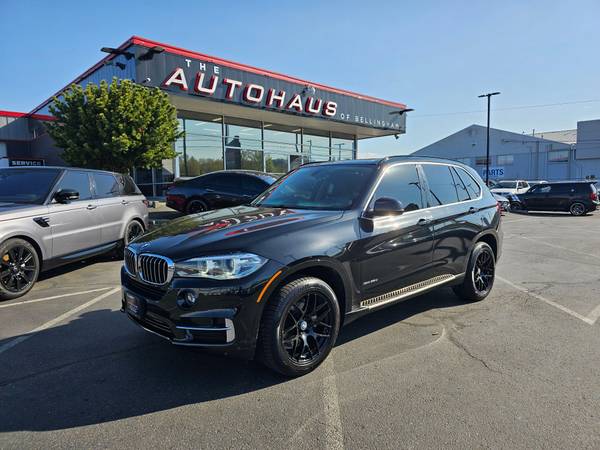 BMW X5 with VIN: 5UXKS4C52E0J95350