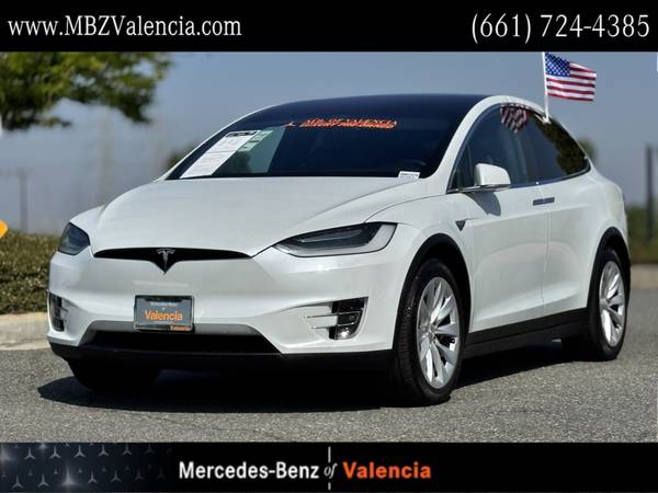 Tesla Model X with VIN: 5YJXCAE25LF283409