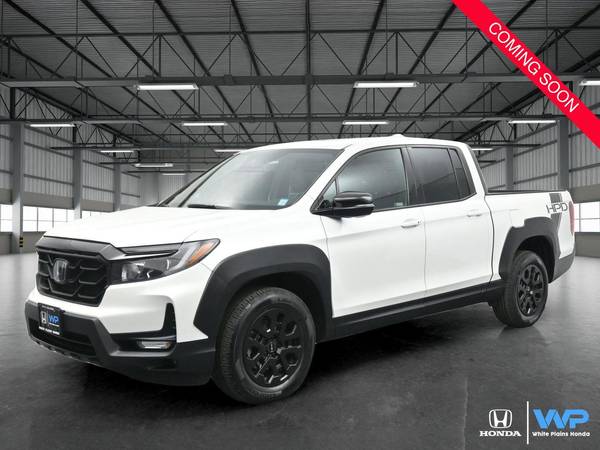 Honda Ridgeline with VIN: 5FPYK3F82NB029883