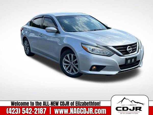 Nissan Altima with VIN: 1N4AL3AP0JC128432