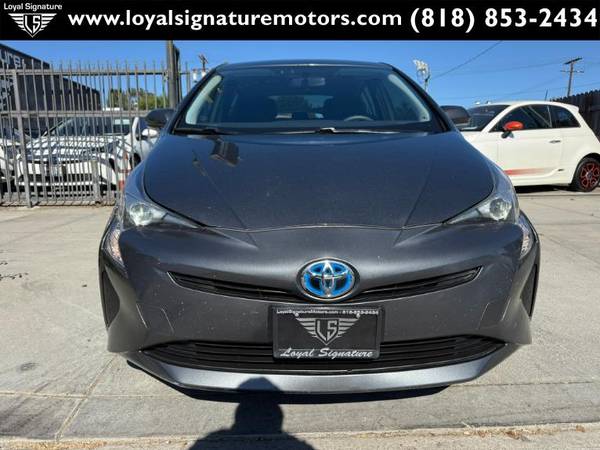 Toyota Prius with VIN: JTDKBRFUXG3011081