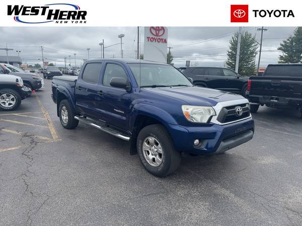 Toyota Tacoma with VIN: 3TMLU4EN3EM163484