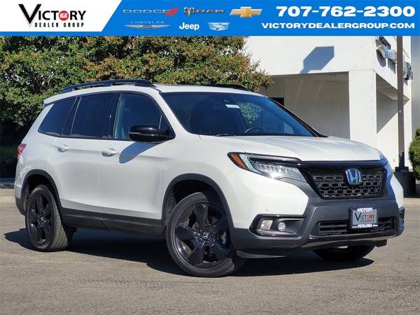 Honda Passport with VIN: 5FNYF8H04MB007609