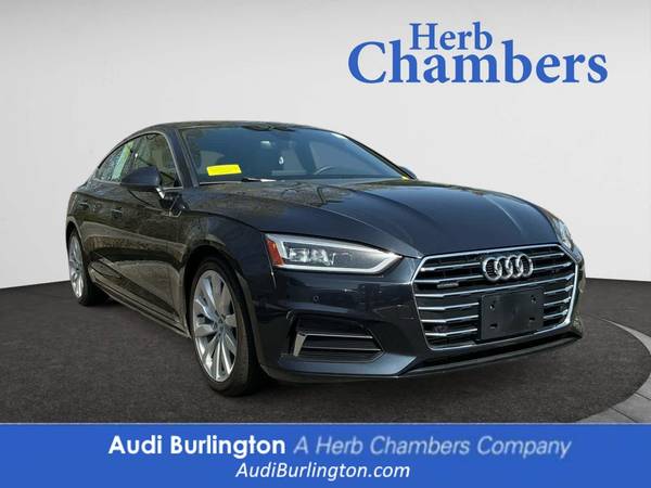 Audi A5 with VIN: WAUBNCF52JA087293