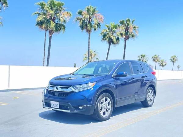 Honda CR-V with VIN: 7FARW1H54KE019929