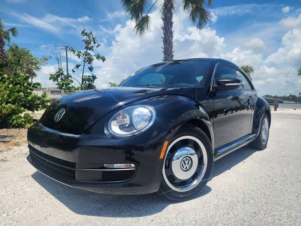 Volkswagen Beetle with VIN: 3VWF17AT5GM638936