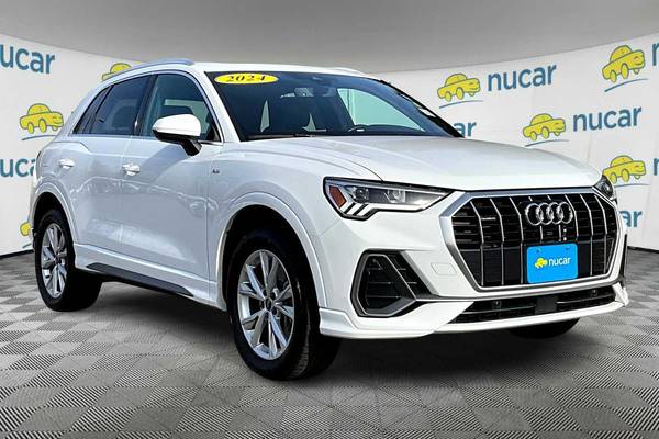 Audi Q3 with VIN: WA1DECF32R1036683
