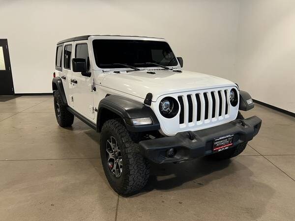 Jeep Wrangler with VIN: 1C4HJXDN6JW202127