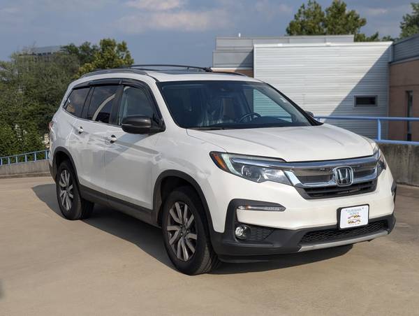 Honda Pilot with VIN: 5FNYF6H59MB045434