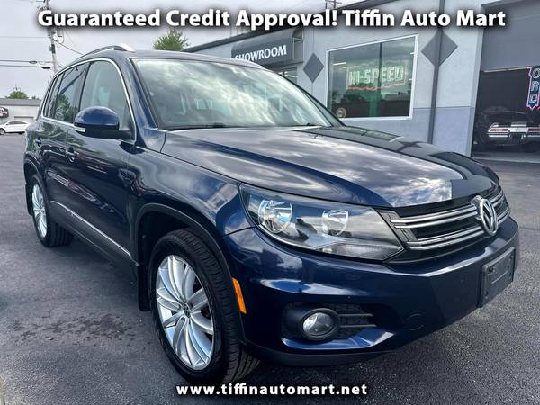 Volkswagen Tiguan with VIN: WVGBV3AX9EW615251