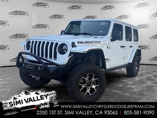 Jeep Wrangler with VIN: 1C4JJXFM7MW778903