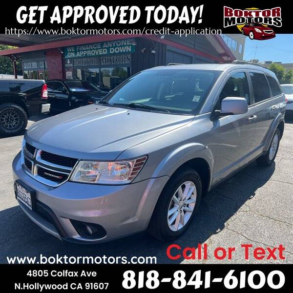 Dodge Journey with VIN: 3C4PDCBG7HT588590