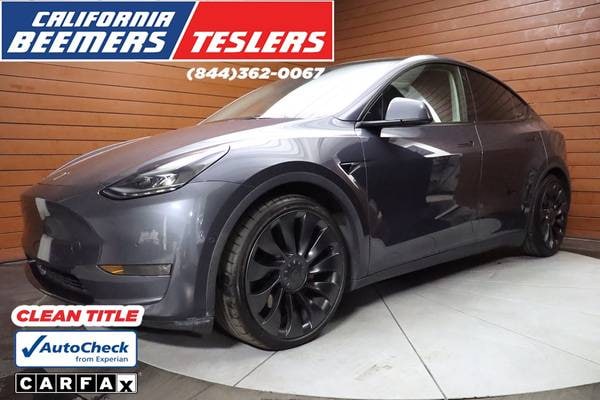 Tesla Model Y with VIN: 7SAYGDEFXNF395044