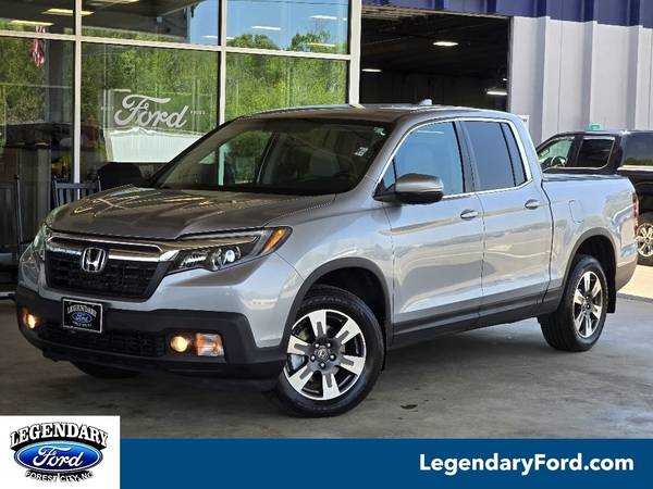 Honda Ridgeline with VIN: 5FPYK3F50HB017337