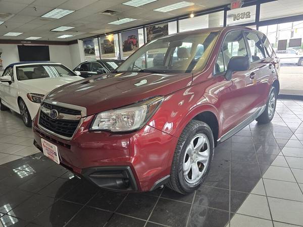 Subaru Forester with VIN: JF2SJAAC7JG402273