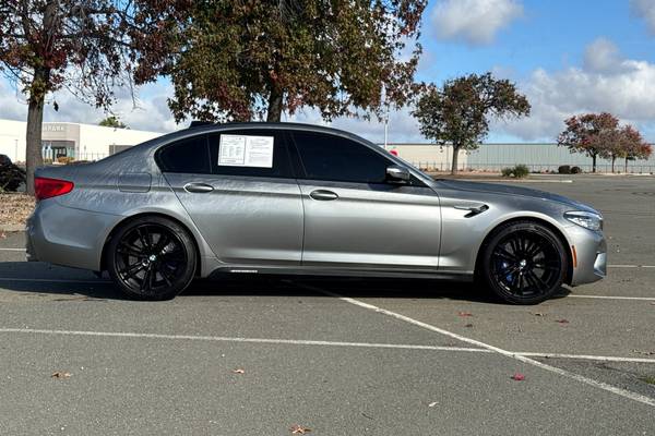 BMW M5 with VIN: WBSJF0C56KB447832