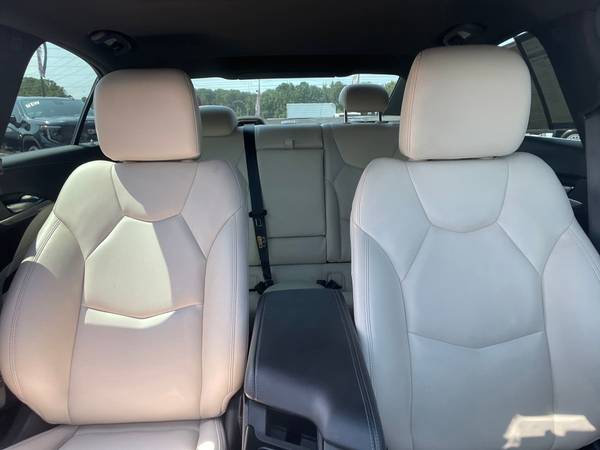 Cadillac CT4 with VIN: 1G6DJ5RK9N0136296