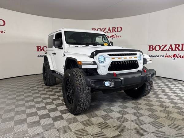 Jeep Wrangler with VIN: 1C4HJXCG7JW281875
