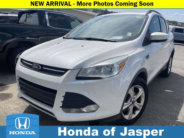 Ford Escape with VIN: 1FMCU0GXXEUD98558