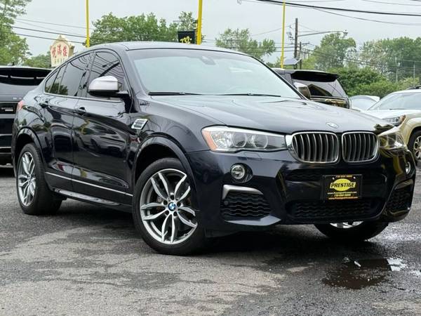 BMW X4 with VIN: 5UXXW7C59J0Z44814