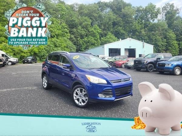 Ford Escape with VIN: 1FMCU9J97EUC77789