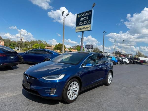 Tesla Model X with VIN: 5YJXCDE24JF088058