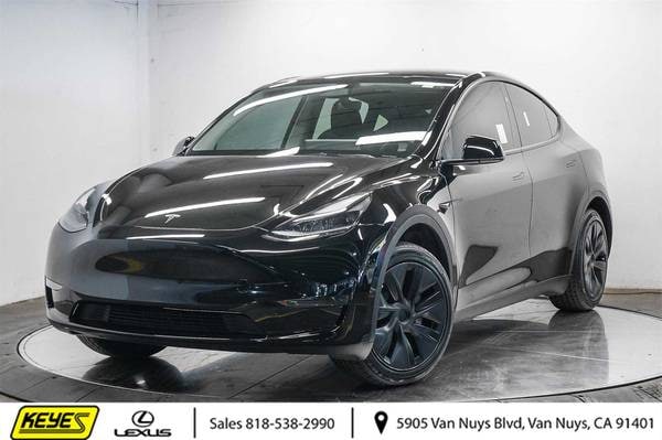 Tesla Model Y with VIN: 7SAYGDED5RF165349