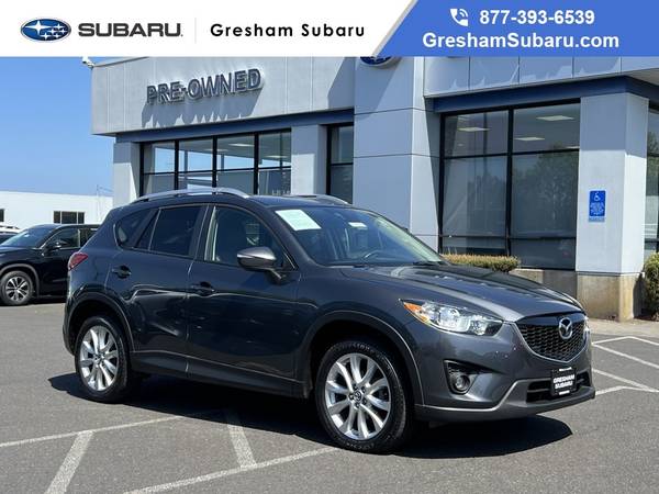 Mazda CX-5 with VIN: JM3KE2DY0F0482572