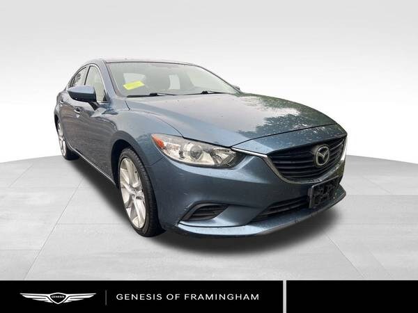 Mazda 6 with VIN: JM1GJ1V53E1103551