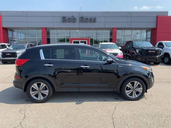 Kia Sportage with VIN: KNDPCCA62E7669234