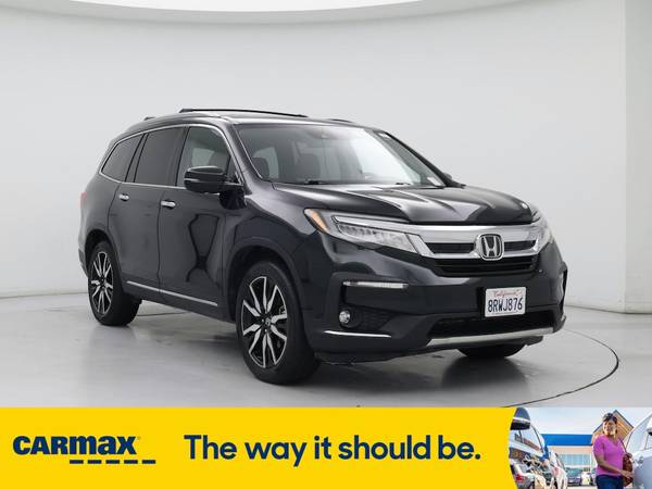 Honda Pilot with VIN: 5FNYF5H6XKB013933