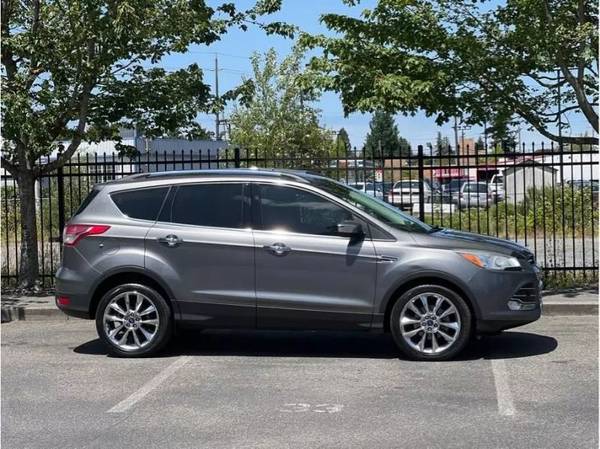 Ford Escape with VIN: 1FMCU0GX7EUC34913