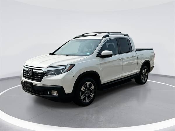 Honda Ridgeline with VIN: 5FPYK3F68HB031835
