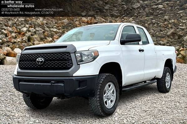 Toyota Tundra with VIN: 5TFUM5F11JX077519