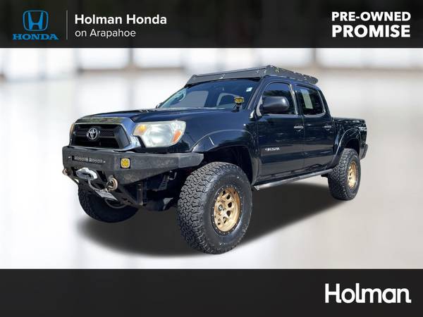 Toyota Tacoma with VIN: 3TMLU4EN8EM147670