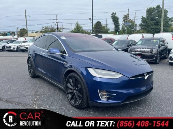 Tesla Model X with VIN: 5YJXCBE4XJF092203