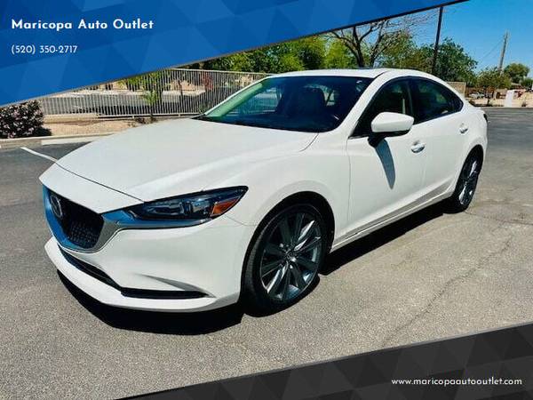 Mazda 6 with VIN: JM1GL1VM5M1605123