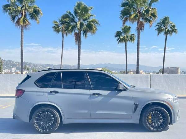 BMW X5 M with VIN: 5YMKT6C53G0R77676