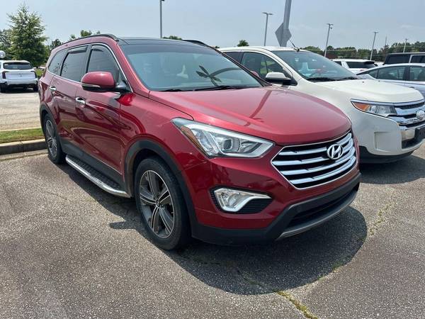 Hyundai Santa Fe with VIN: KM8SR4HFXEU077940