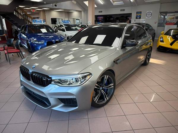BMW M5 with VIN: WBSJF0C55JB283813